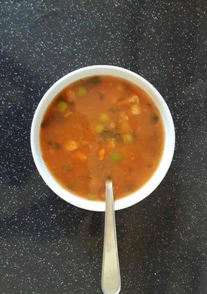 A picture of Tomato and pea soup.