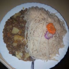 Spaghetti with kamande stew A picture of Spaghetti with kamande stew.