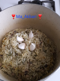 عکسی از دستور دم کردن برنج با سیر