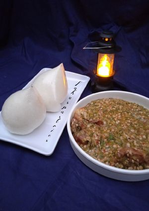 A picture of Tuwo with Okro soup.
