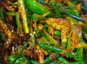 A picture of green chilli and lemon pickle