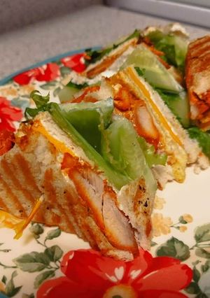 A picture of Tandoori chicken club sandwich.