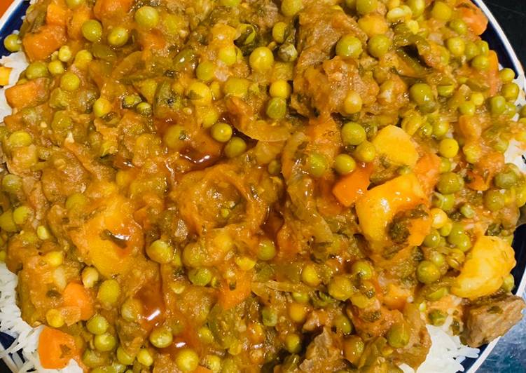 How to Make Award-winning Rice and peas(Peas, Irish, carrots and beef)