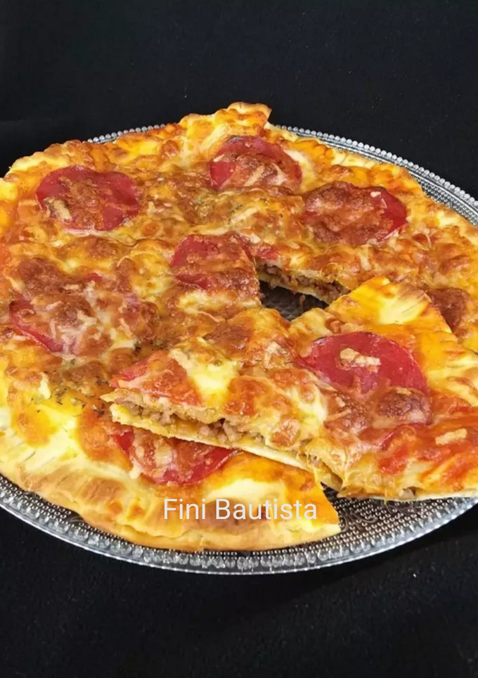 Una foto de Pizza doble