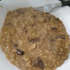 Una foto de Risotto de hongos de pino