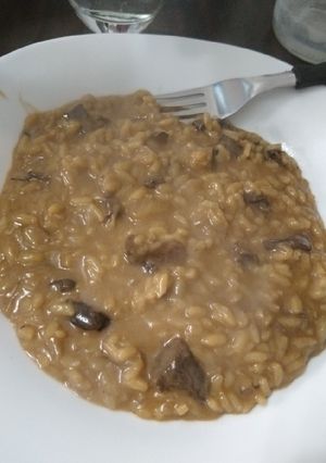 Una foto de Risotto de hongos de pino