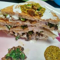 Mushroom sandwich with mustard sauce A picture of Mushroom sandwich with mustard sauce.