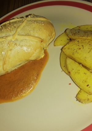 Una foto de Rollo de chile poblano hojaldrado