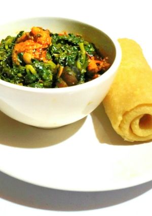 A picture of Lamb Lettuce (Waterleaf) Soup And Yellow Eba.