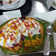 A picture of Surprise dahi bhala and mango smoothie.