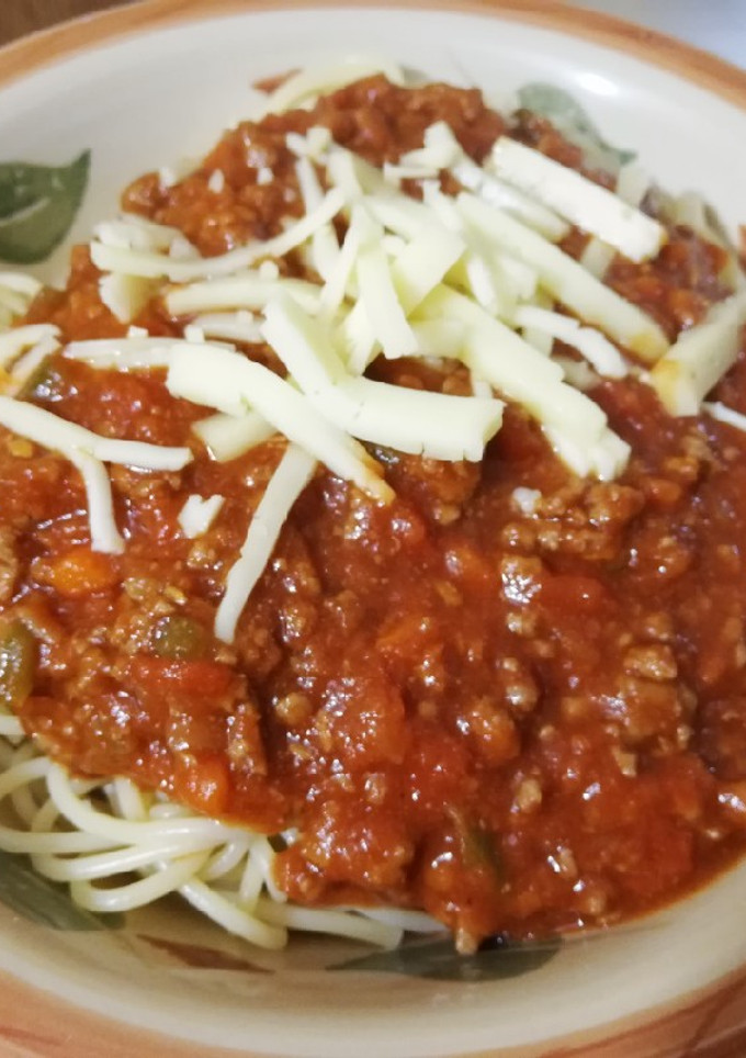 Una foto de Salsa de tomate y carne