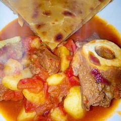 Beef goulash served with chapati A picture of Beef goulash served with chapati.
