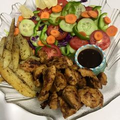 A picture of Boneless chicken tikka in fry pan.