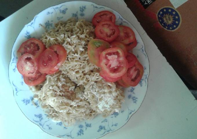 Noodles and unscrambled cook eggs