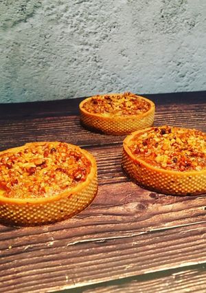 Une photo de Tartelette pomme-cannelle et noix