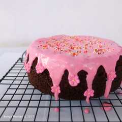 A picture of Brownies Kukus with Strawberry Glaze.