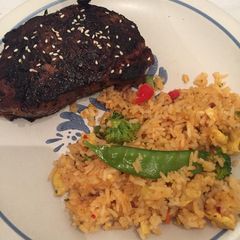 A picture of Asian Sirloin Steak with Thai Drunken Fried Rice.
