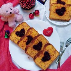 A picture of Funfetti orange cake with hidden heart.