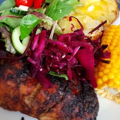 A picture of Jerk flavour chicken.