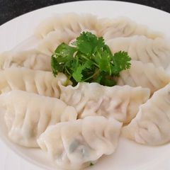 A picture of Chicken momo (Indian/Nepali art).
