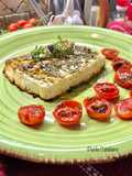 Feta in forno aromatizzata con pomodorini confit