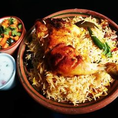 A picture of Chicken Tikka Biryani😋💛🍲.