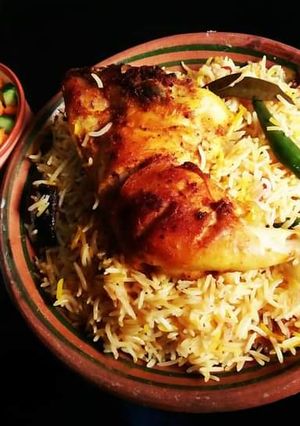 A picture of Chicken Tikka Biryani😋💛🍲.