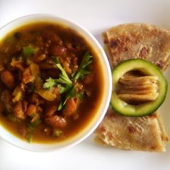 A picture of Nice beans stew with chapati.