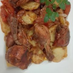 A picture of Chicken Tandoori with Potatoes.
