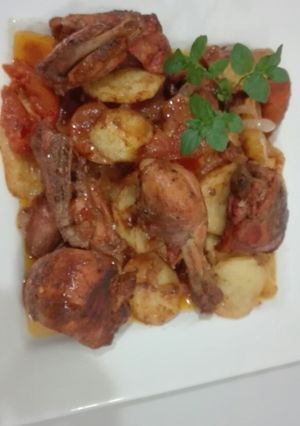 A picture of Chicken Tandoori with Potatoes.