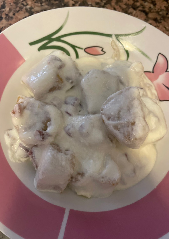 Una foto de Dadignocchis de calabaza con salsa de queso suave