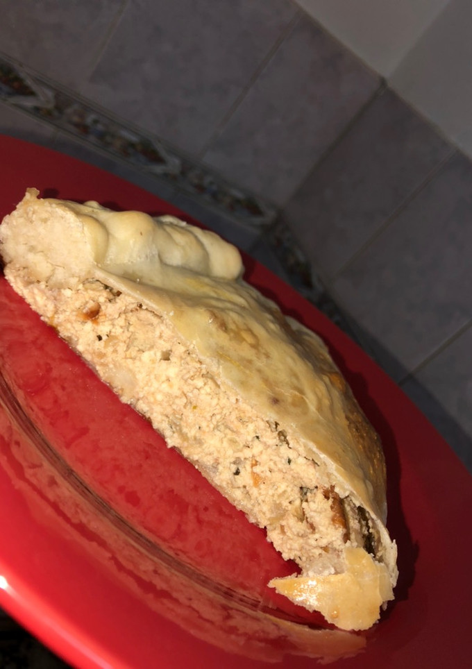 Una foto de Empanada gallega de cebolla y ricotta
