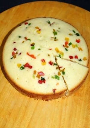 A picture of Suji cake on tawa.