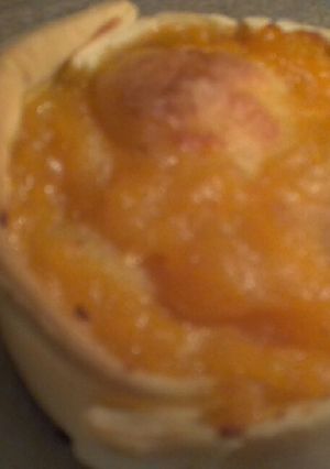 Una foto de Canastitas agridulces de zapallo y cebolla caramelizada