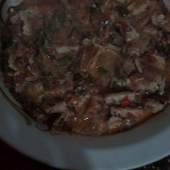 A picture of Eggs and omena stew.