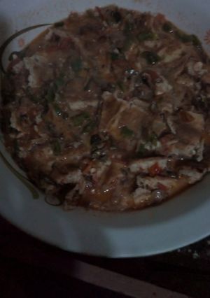 A picture of Eggs and omena stew.