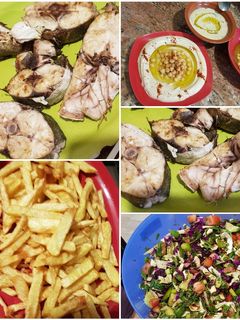 صورة لوصفة سمك زرزور مشوي مع حمص متبل + فتوش + بطاطا مقلية