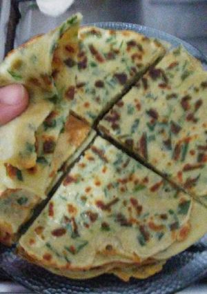 Una foto de Tortilla finita de cebolla de verdeo, tipo panqueque