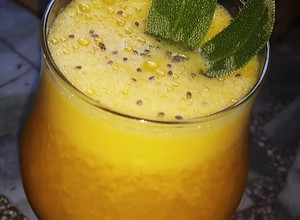 Una foto de Jugo de naranjas, zanahoria y jengibre