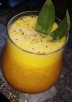 Una foto de Jugo de naranjas, zanahoria y jengibre