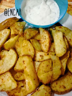 Una foto de Patatas especiadas al horno