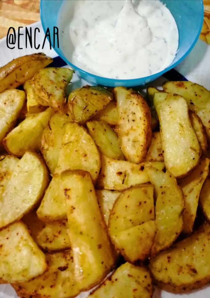 Una foto de Patatas especiadas al horno