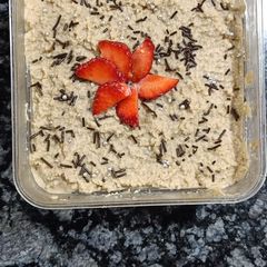 A picture of Coffee Custard Pudding with Strawberries.