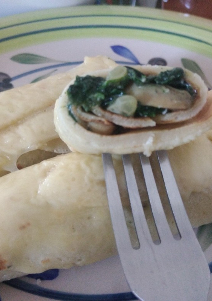 Una foto de Panqueque de espinaca, champiñón y queso azul