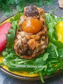 Una foto de Boniato relleno con setas