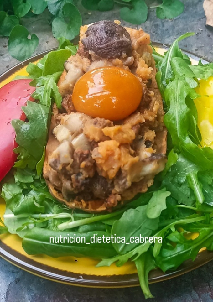 Una foto de Boniato relleno con setas