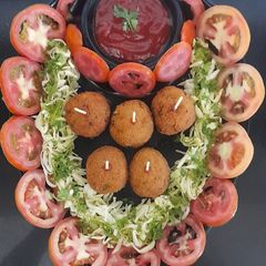 A picture of Vegetable cheese lolipop.