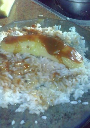 Una foto de Bananas con arroz y dulce de leche