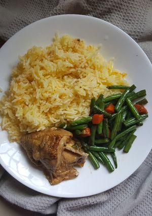 A picture of Stir Fry Veggies With Carrot Rice and Chicken.