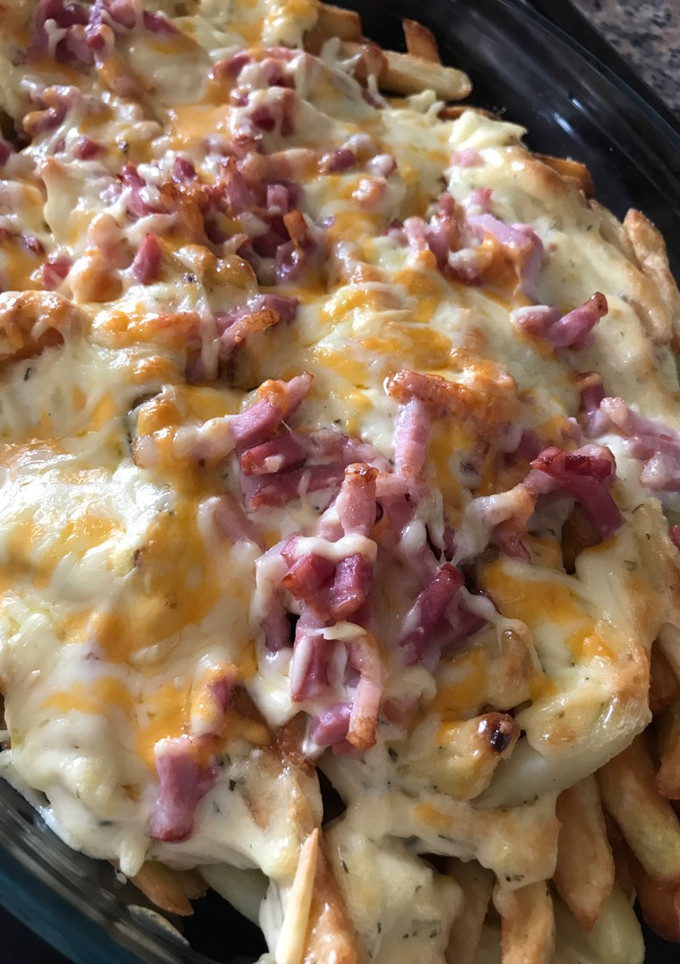 Una foto de Bacon cheese fríes 🍟